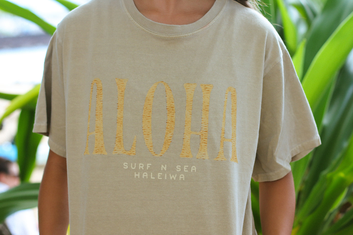 SNS WOMENS TIKI ALOHA CROP TEE