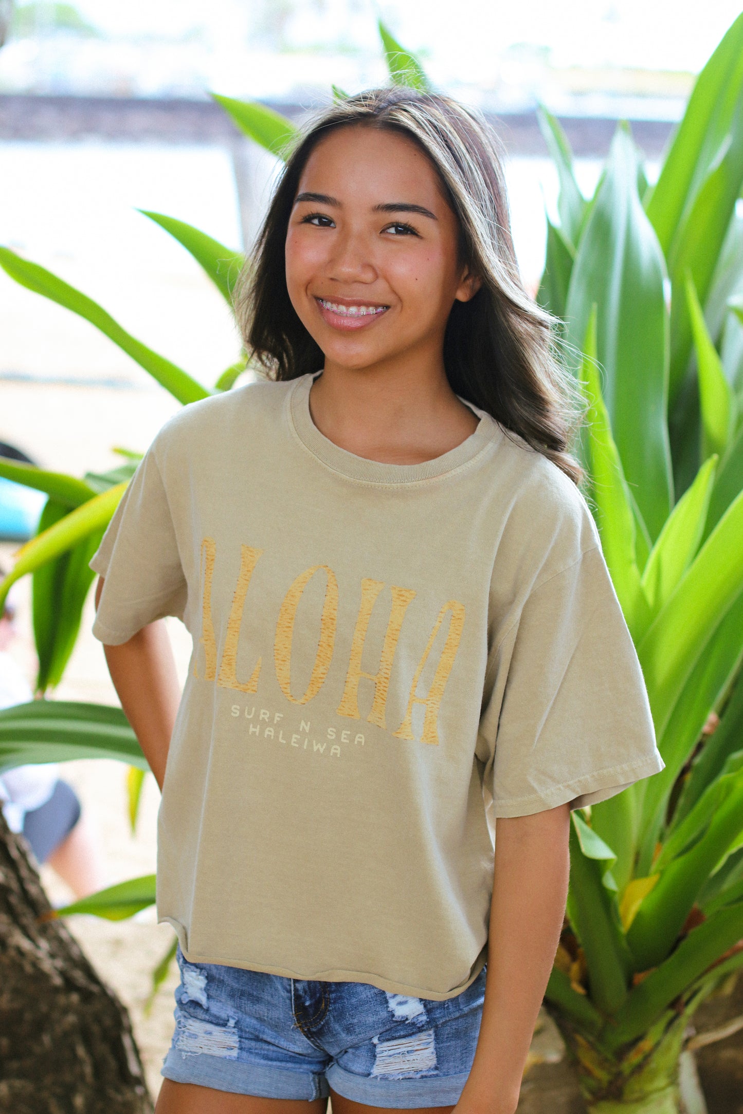 SNS WOMENS TIKI ALOHA CROP TEE