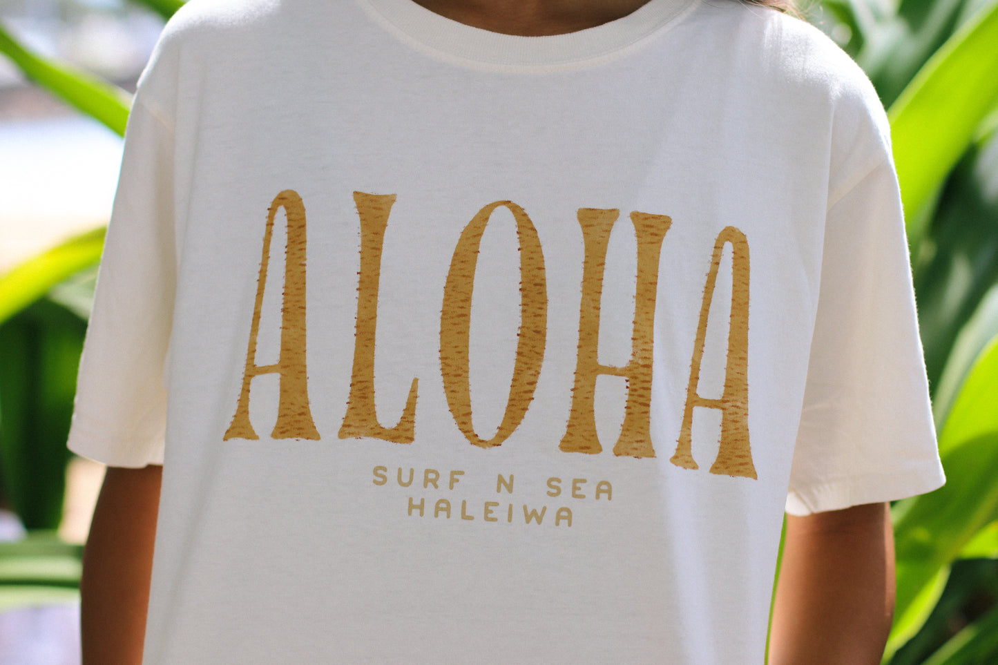 SNS WOMENS TIKI ALOHA CROP TEE